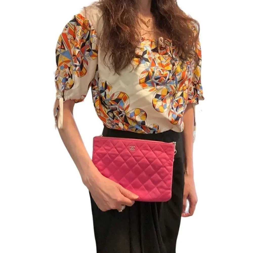 Chanel caviar Quilted pink leather Clutch